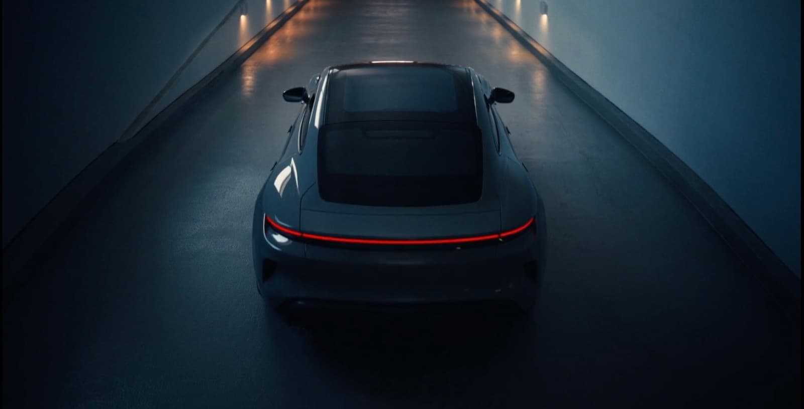 A Porsche in a dark cinematic commercial scene