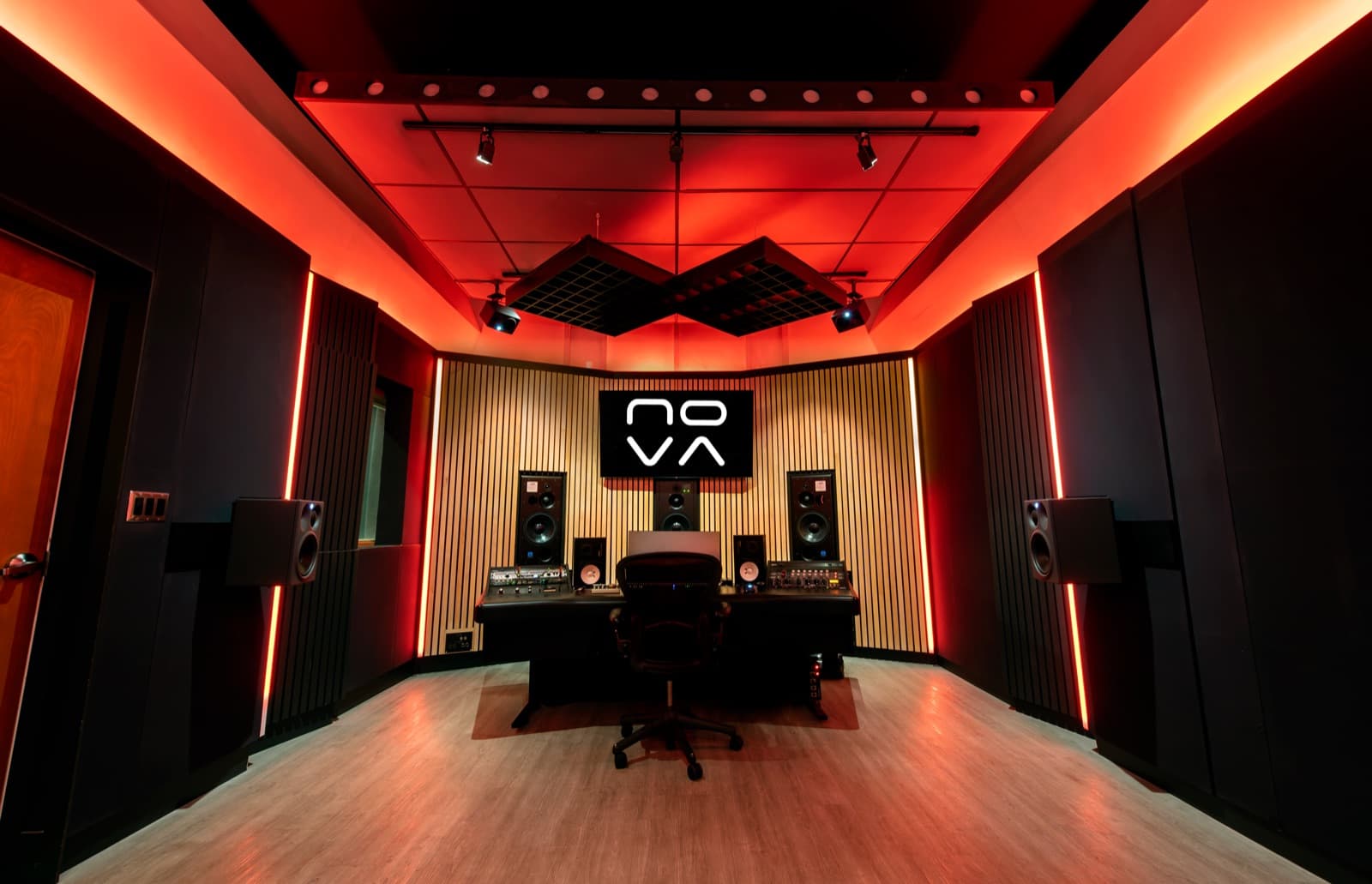 The NOVA Studios immersive audio room lit in red